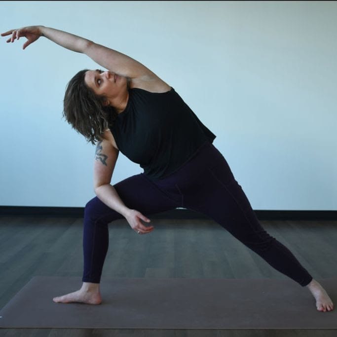 Robin Briskey releases sorrow in extended side angle pose